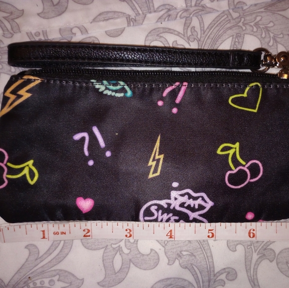 Betsey Johnson Handbags - EUC Betsey Johnson wristlet, clean inside & out. The inside is pink.